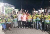 AJP-ASLI bersama warga Jalan Tunggala, Kelurahan Anwai, Kecamatan Wua-wua. Foto: Ist